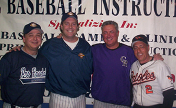 PBI's Doug Cinnella and Dave Trautwein, Rockies Manager Clint Hurdle, and Mariners 3B Coach Sam Perlozzo.
